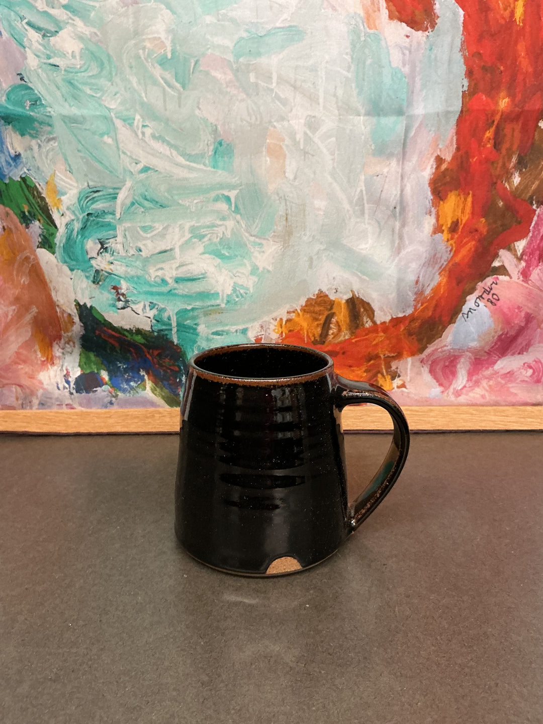 Mug in Tenmoku by Lucy Rutter