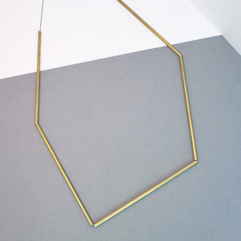Scaffolding Asymmetric Pendant by Factory Floor Jewels