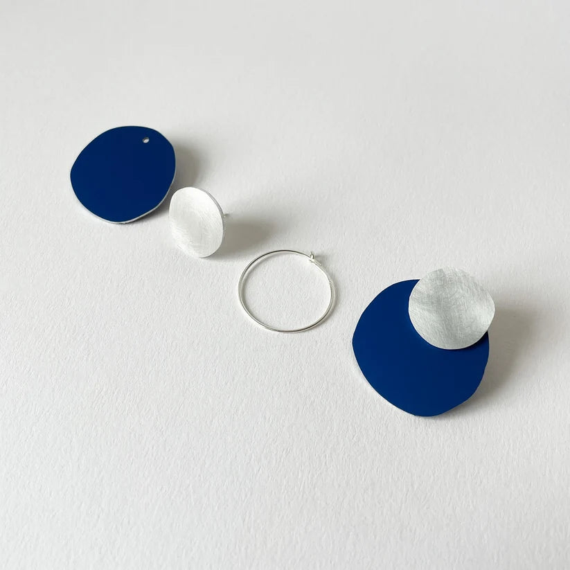 Silver Aluminium Cast Earrings by Tom Pigeon