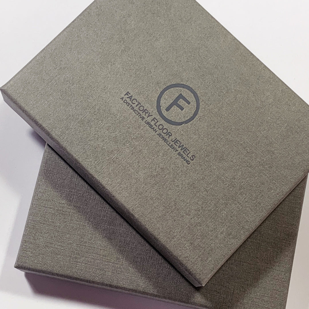 Steel and Brass mismatch big earrings by Factory Floor Jewels