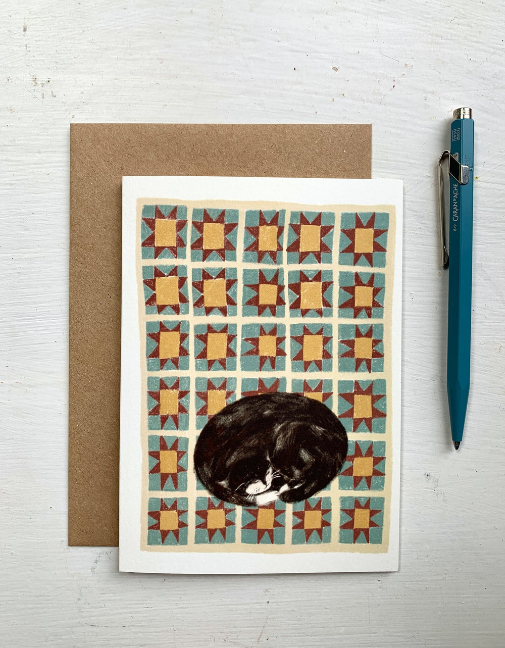 Edie Star Quilt Cat Greetings Card by Nicola Clarke