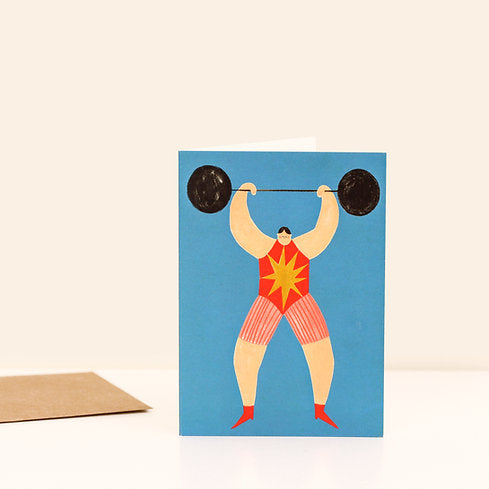 Strong Man Greetings Card byLittle Black Cat Illustrated